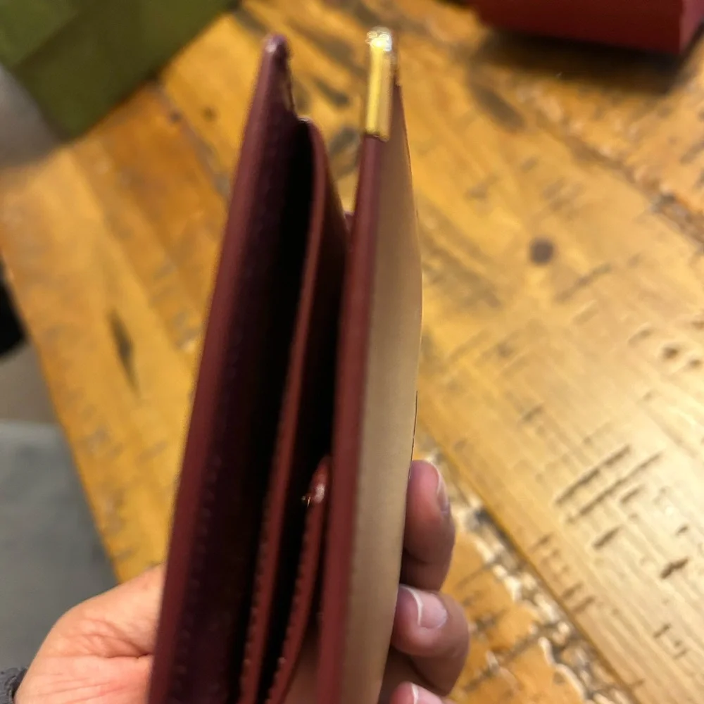 Cartier Deep Burgundy Leather bifold Gold Corner Hardware